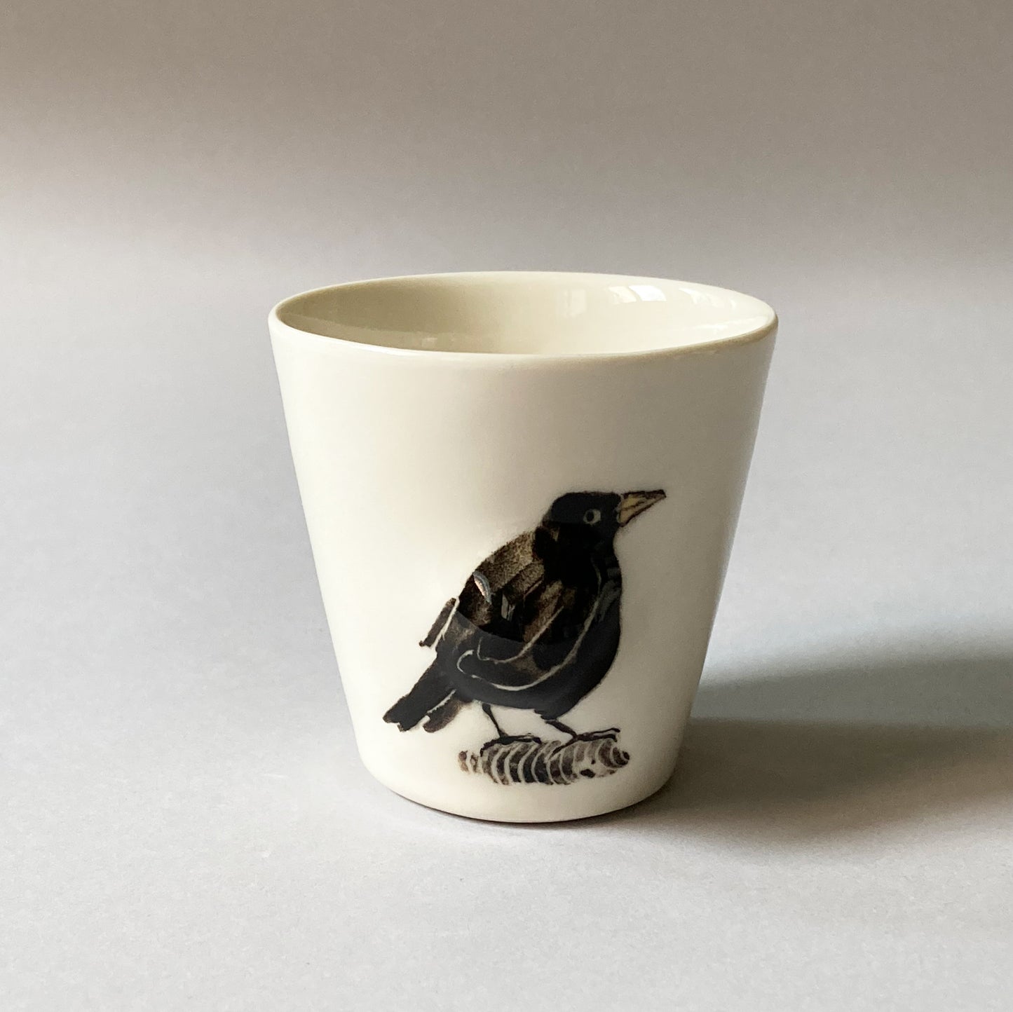 Espresso cup with bird